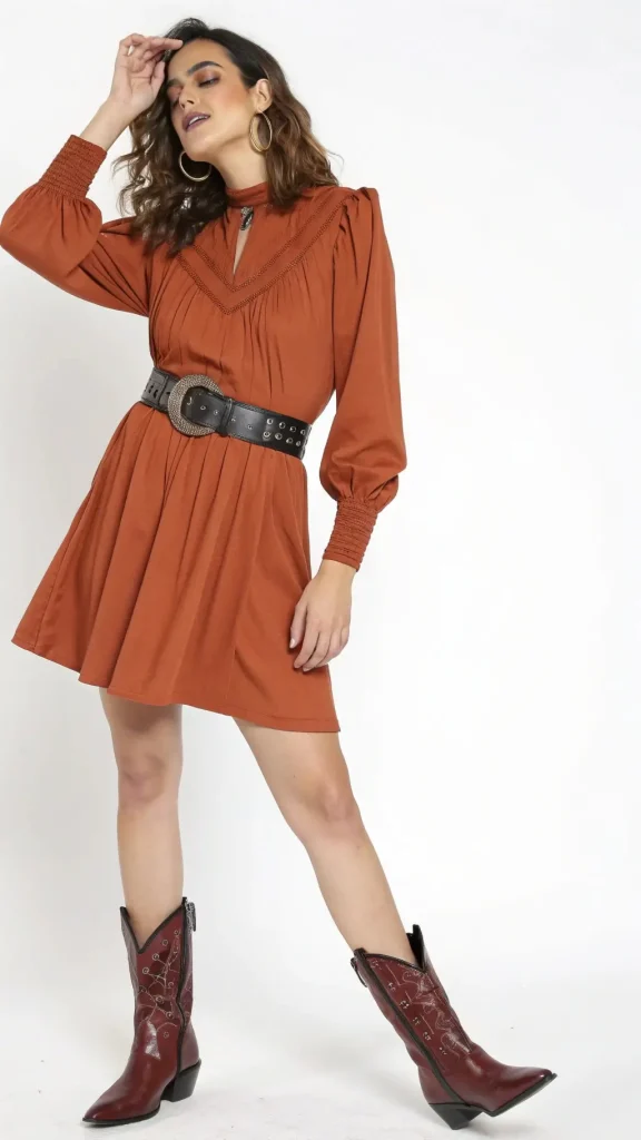 It is image on Burgundy Cowboy Boots with Rust Dress.