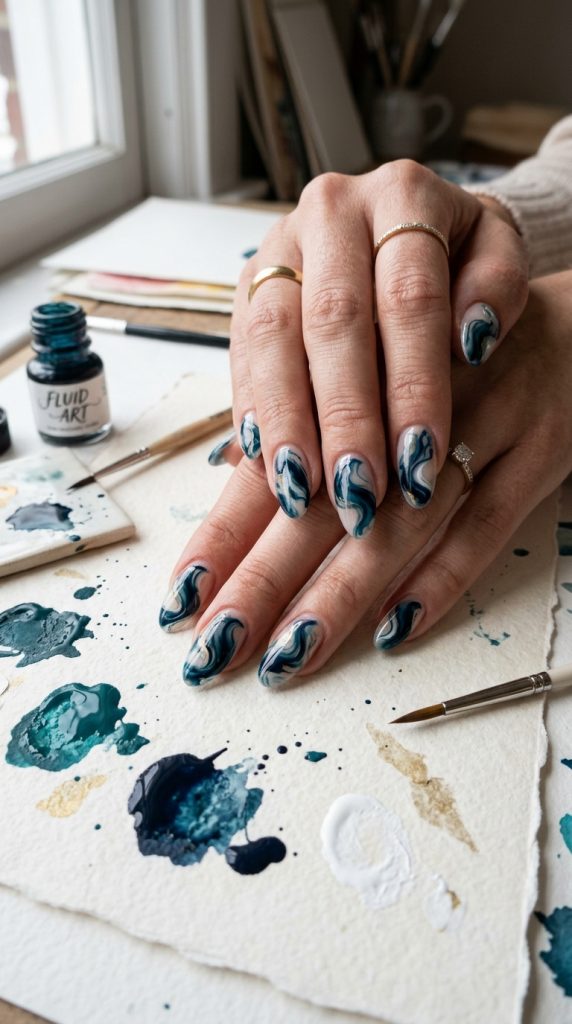 abstract ink swirl oval nail art navy teal white organic swirls different each nail watercolour paper paint swatches artistic natural light fluid editorial 2026
