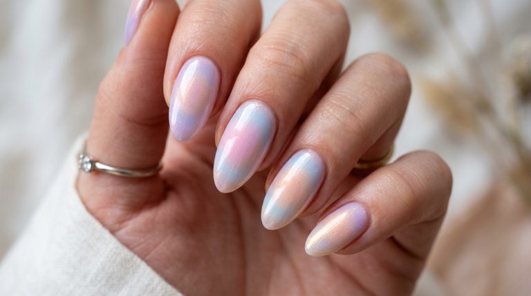 Trendy aura nails with a soft glowing pastel gradient
