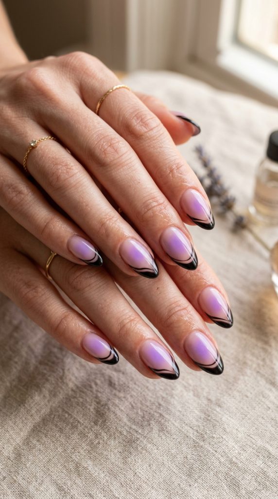 Lavender aura nails with a dreamy purple glow