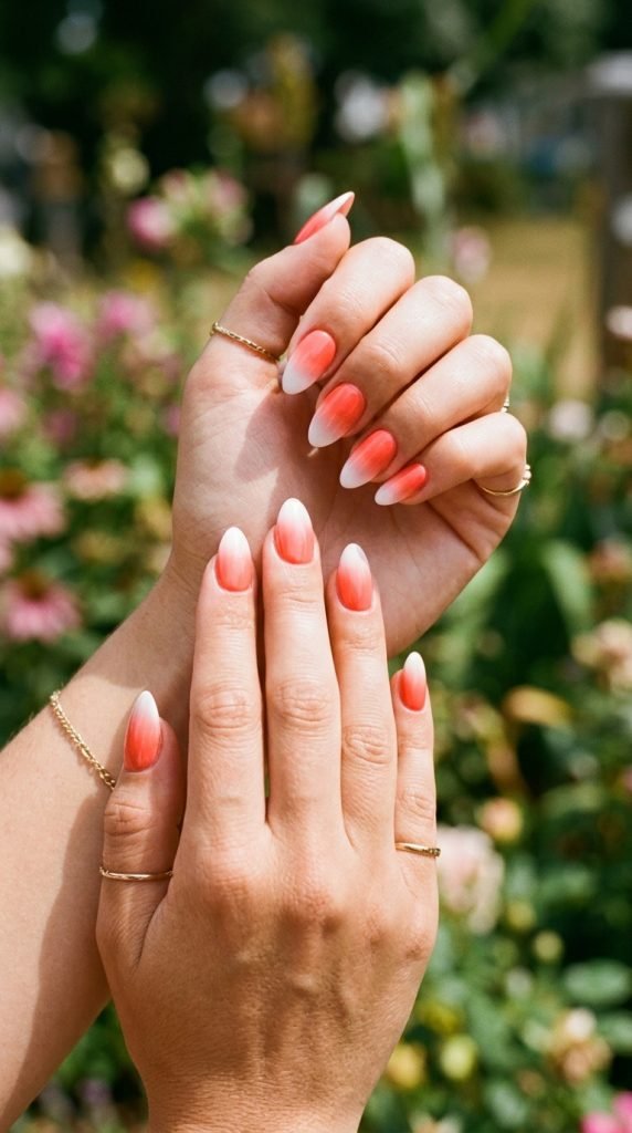 Coral nails with white ombre gradient tip design