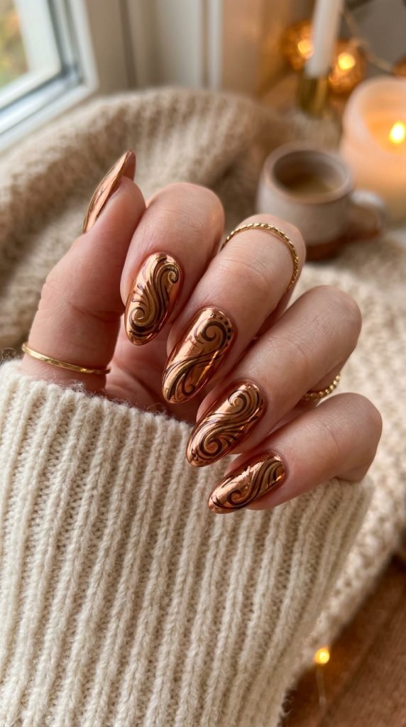 Copper chrome gel nails with abstract swirl design