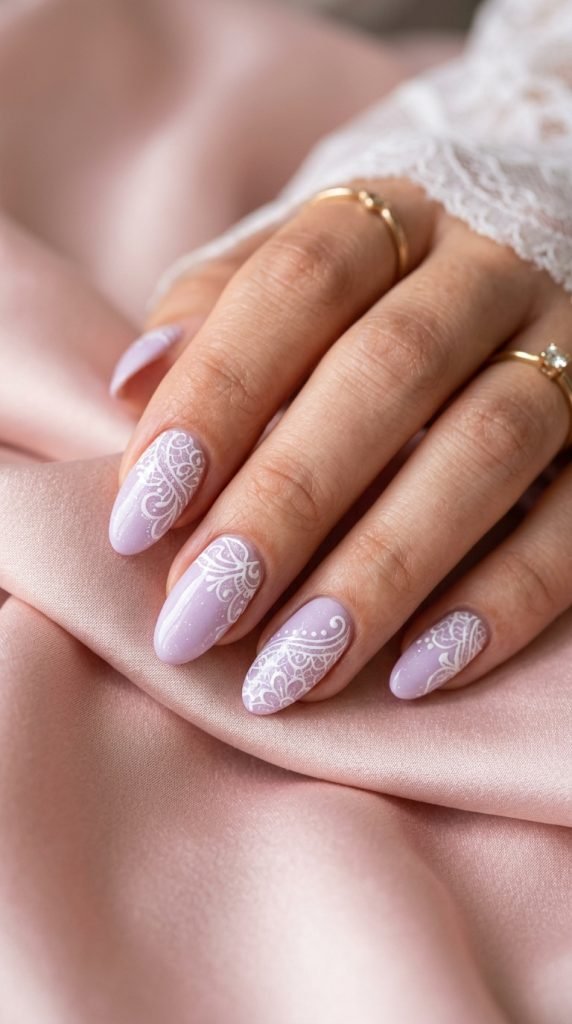 Soft lavender gel nails with white delicate lace pattern