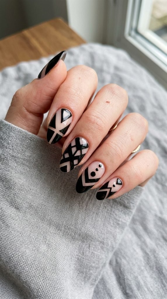 Modern geometric negative space gel nail design with artistic cutouts
