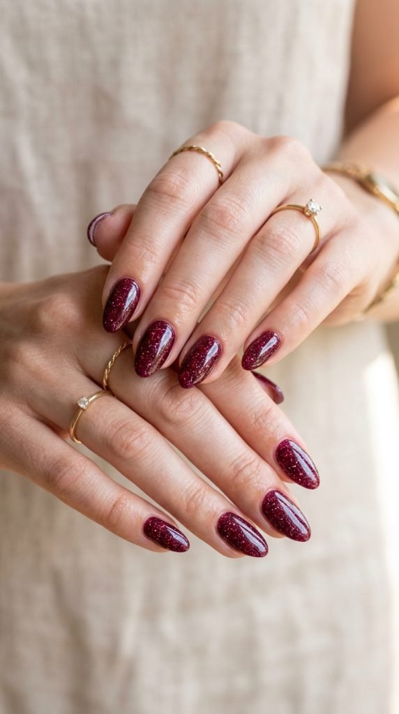 Deep burgundy gel nails with glossy luxurious finish