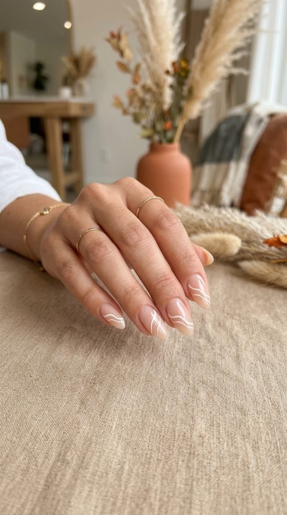 Minimalist wave line nails showing clean elegant beach-inspired design