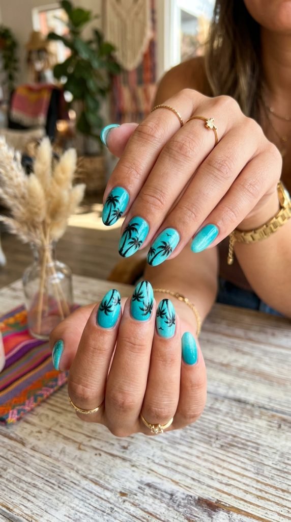 Palm tree tropical silhouette nails showing vacation beach mood