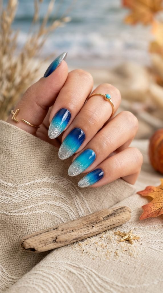 Ocean depth gradient nails showing navy to turquoise color progression